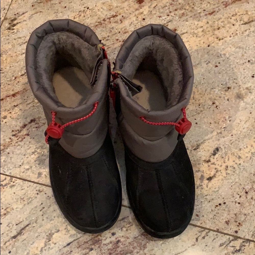Ugg Waterproof. Like new. Worn twice.